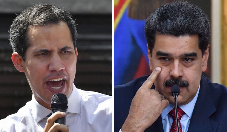Venezuela's National Assembly head Juan Guaido (left) and Venezuelan President Nicolas Maduro | AFP
