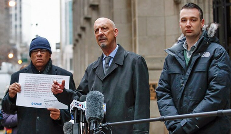 Peter Isely (C), US spokesperson for Ending Clergy Abuse, talks during the press conference outside the Archdiocese of Chicago | PTI