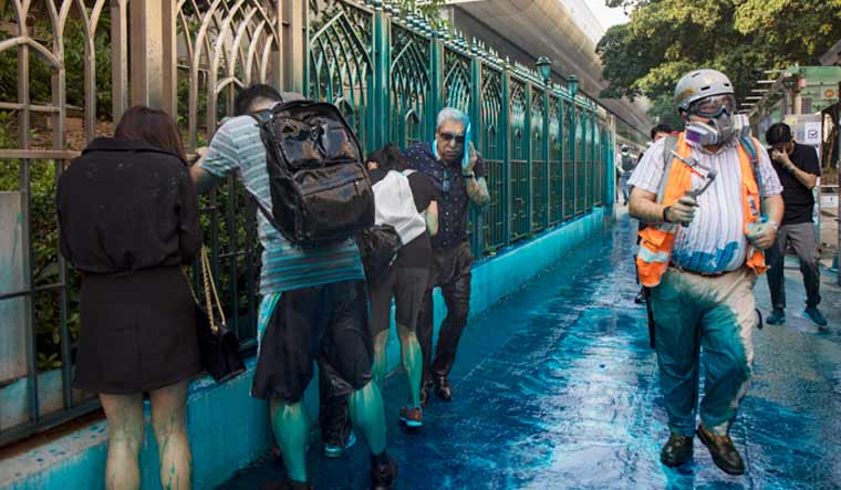 Mohan-Chugani-Kowloon-Mosque-Hong-Kong-Blue-Dye-AFP