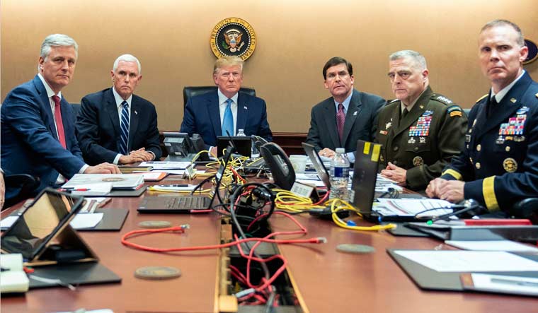 President Donald Trump joined by (from left), national security adviser Robert O'Brien, Vice President Mike Pence, Defense Secretary mark Esper, Joint Chiefs Chairman Gen. Mark Milley and Brig. Gen. Marcus Evans, Deputy Director for Special Operations on the Joint Staff, Saturday, Oct. 26, 2019, in the Situation Room of the White House in Washington | AP