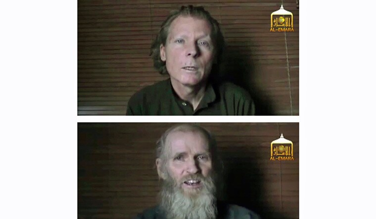 This two photo combination image taken from video released June 21, 2017 shows kidnapped professors Australian Timothy Weekes, top, and American Kevin King | AP