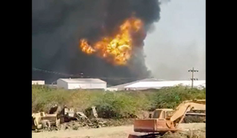 Sudan-Khartoum-factory-fire-Mohanad-Mohamed-via-Reuters