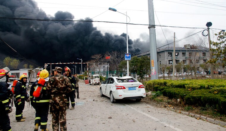 Rescuers near the site of the factory explosion in a chemical industrial park in Yancheng in eastern China's Jiangsu province | Chinatopix via AP