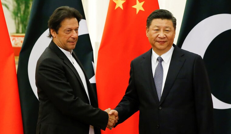 [File] Pakistan Prime Minister Imran Khan and Chinese President Xi Jinping | Reuters