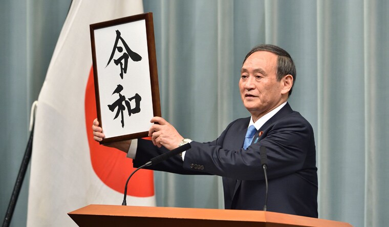 Japan's Chief Cabinet Secretary Yoshihide Suga announces the new era name 'Reiwa' | AFP
