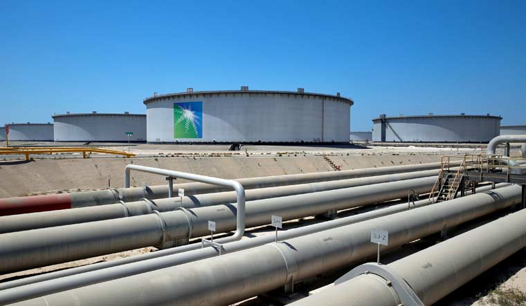 General view of Aramco tanks and oil pipe at the Ras Tanura oil refinery and oil terminal in Saudi Arabia | Reuters