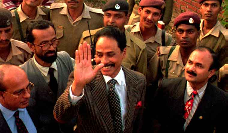 [File] Former Bangladesh president Hussain Muhammad Ershad [centre] | AP
