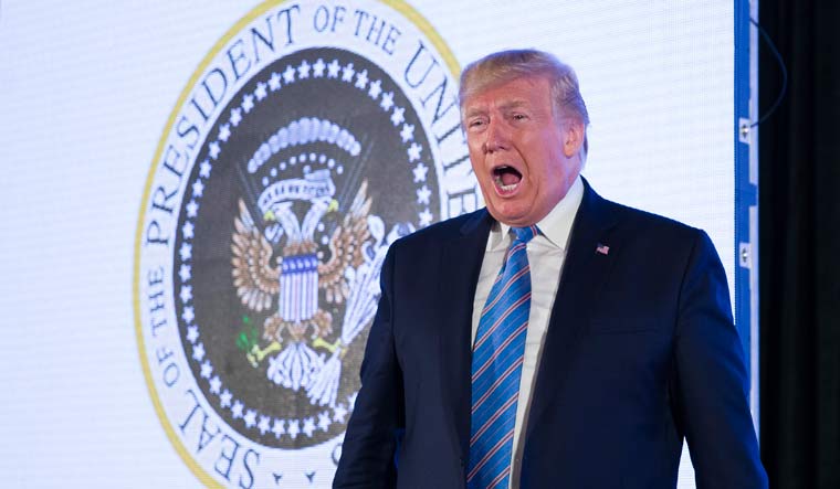 US President Donald Trump reacts to the audience before speaking at Turning Point USA's Teen Student Action Summit 2019 in Washington | AP