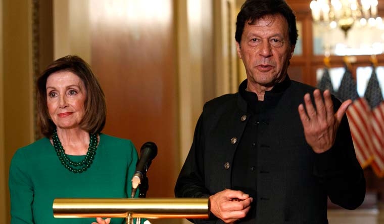 Pakistan's Prime Minister Imran Khan, right, speaks to the media with House Speaker Nancy Pelosi | AP