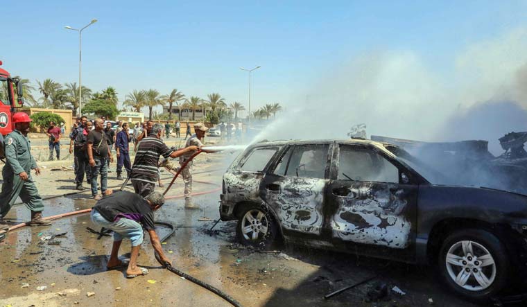 Car bomb kills 3 UN staff outside mall in Libya