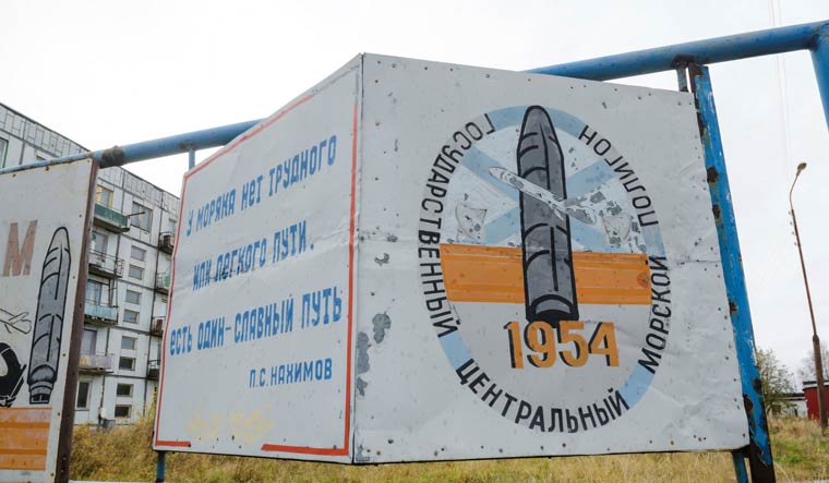 A view shows a board on a street of the military garrison located near the village of Nyonoksa in Arkhangelsk Region, Russia October 7, 2018. The board reads: "State Central Naval Range". Picture taken October 7, 2018. 