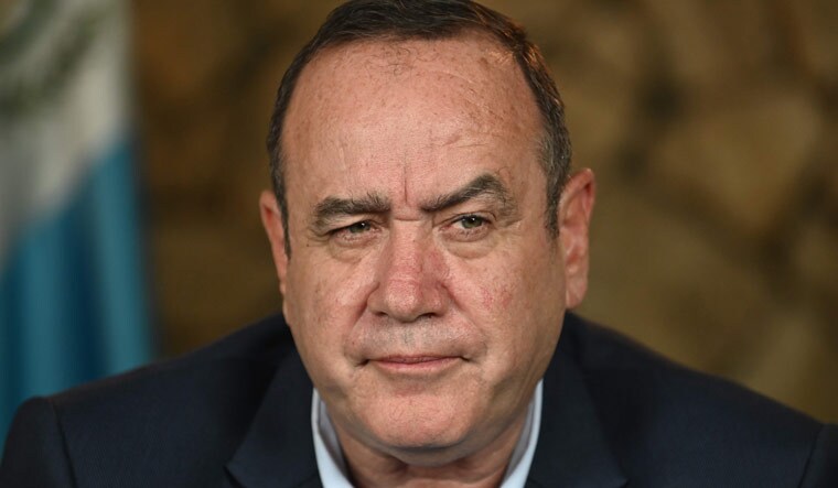 President-elect Alejandro Giammattei gestures during an interview with AFP in Guatemala City on August 12, 2019 | AFP