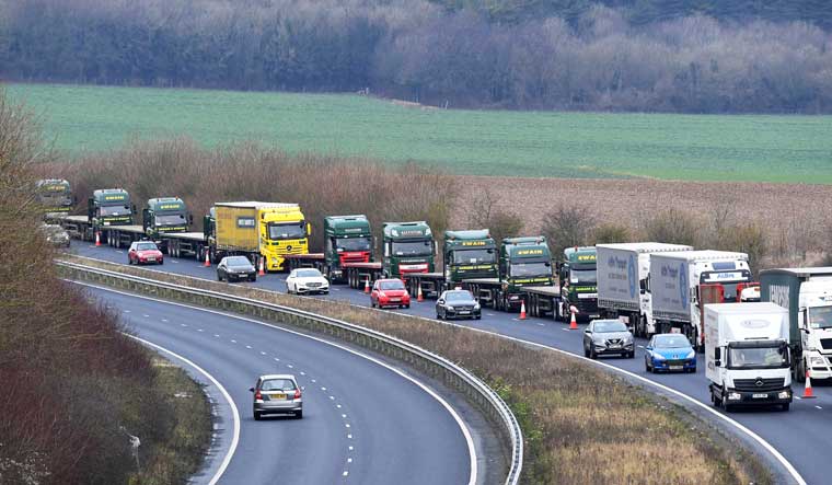 FILE PHOTO: A line of lorries is seen during a trial between disused Manston Airport and the Port of Dover of how road will cope in case of a "no-deal" Brexit, Kent, Britain January 7, 2019 | Reuters