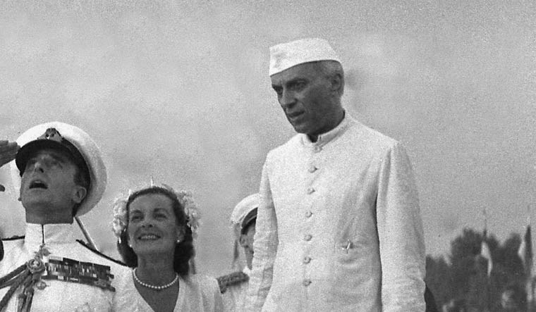 Lord Mountbatten is seen saluting the Indian national flag hoisted at the India Gate as Lady Edwina and Prime Minister Jawaharlal Nehru look on, in New Delhi on August 15, 1947, the first Independence Day of India | PTI