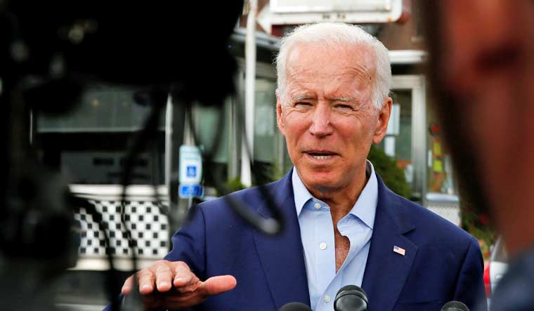Democratic 2020 U.S. presidential candidate and former Vice President Joe Biden talks to reporters outside Lindy's Diner in Keene | Reuters