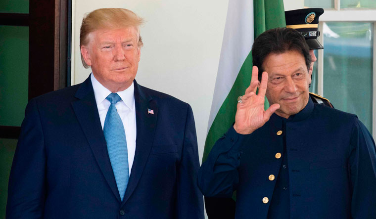 File photo of US President Donald Trump and Pakistan Prime Minister Imran Khan during their meeting at the White House on July 22 | AFP