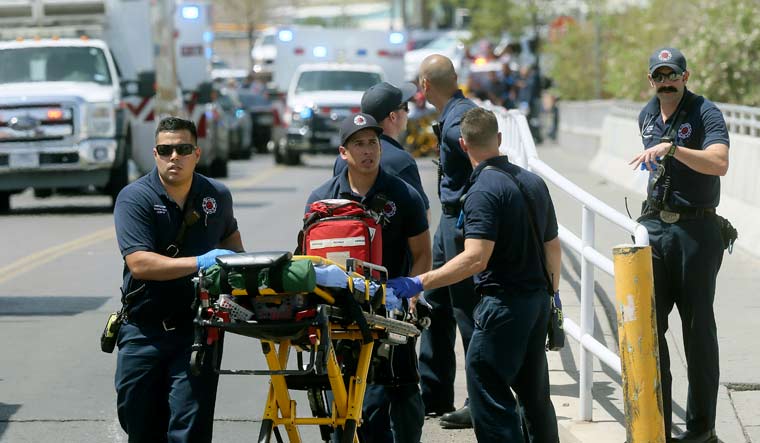 El Paso Fire Medical personnel arrive at the scene of a shooting at Walmart | El Paso Times via AP