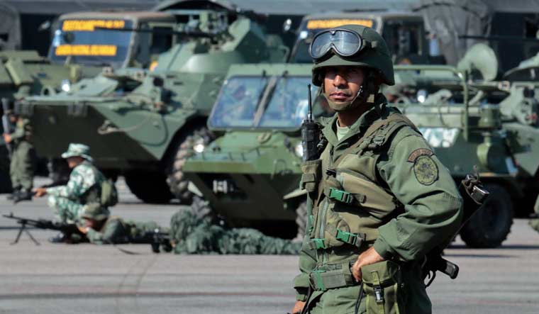 Members of the National Guard take part in a military exercise at Garcia Hevia airport in La Fria, Tachira state Venezuela | AFP
