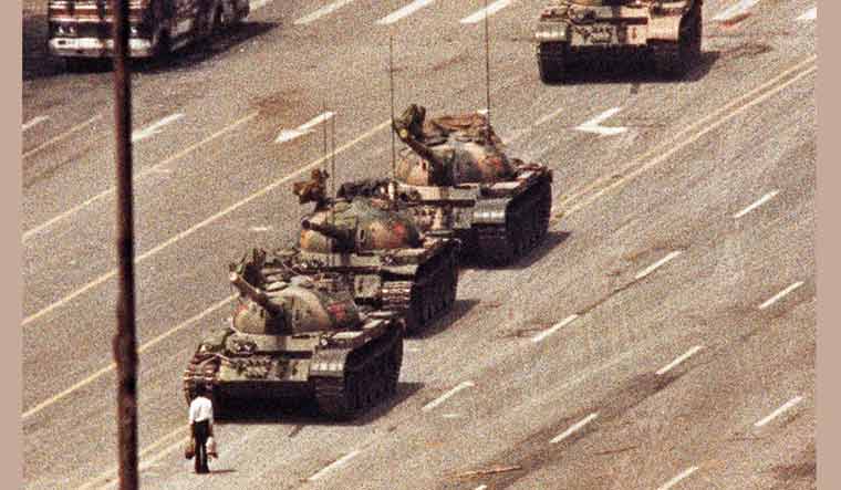 The iconic image of a man trying to block a Chinese military tank at Beijing | Archive