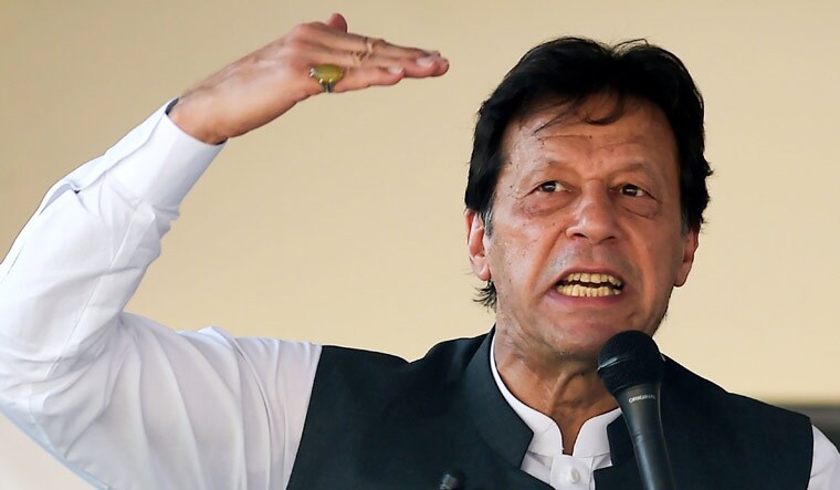 File photo of Pakistan Prime Minister Imran Khan at a rally in Muzaffarabad on September 13 | AFP