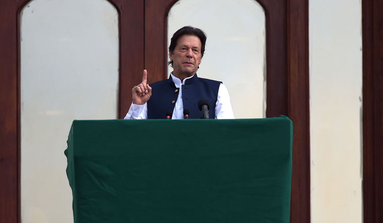 Both Pakistan and India are nuclear powers and if tension escalates the world will face danger, says Imran Khan | AFP