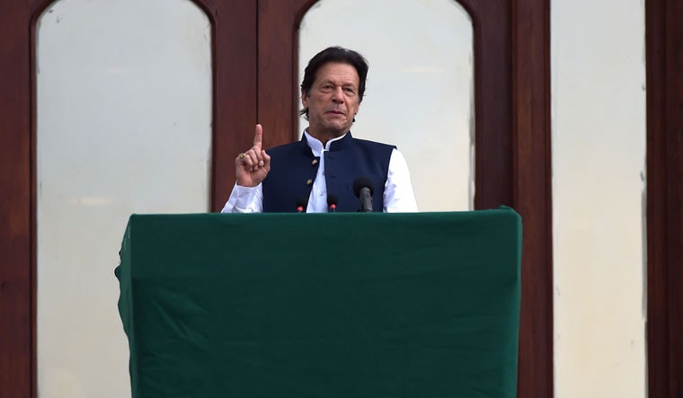 Both Pakistan and India are nuclear powers and if tension escalates the world will face danger, says Imran Khan | AFP