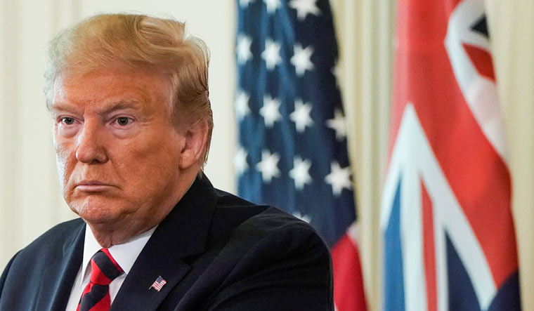 President Donald Trump speaks in the Oval Office while meeting with Australian Prime Minister Scott Morrison | Reuters