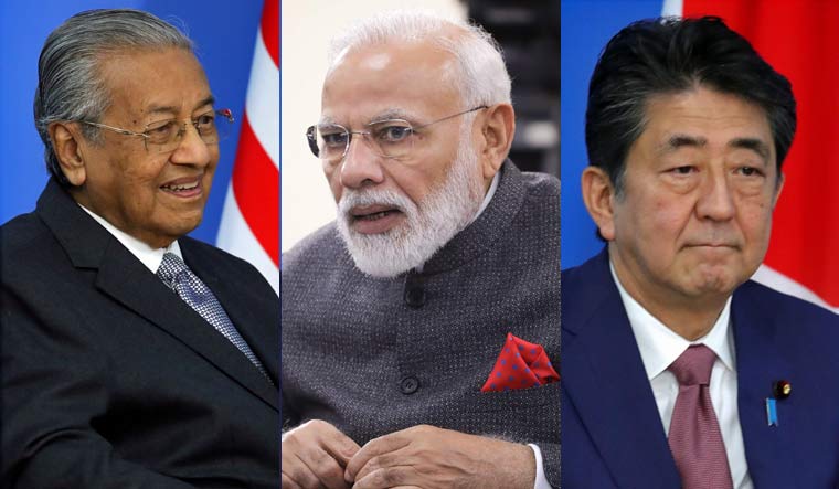 Malaysian PM Mahathir Mohamad, PM Narendra Modi, Japanese PM Shinzo Abe | AP