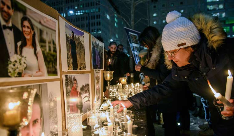 Members of Montreal's Iranian community attend a vigil for the victims of the Ukraine International Airlines crash in Tehran | AP