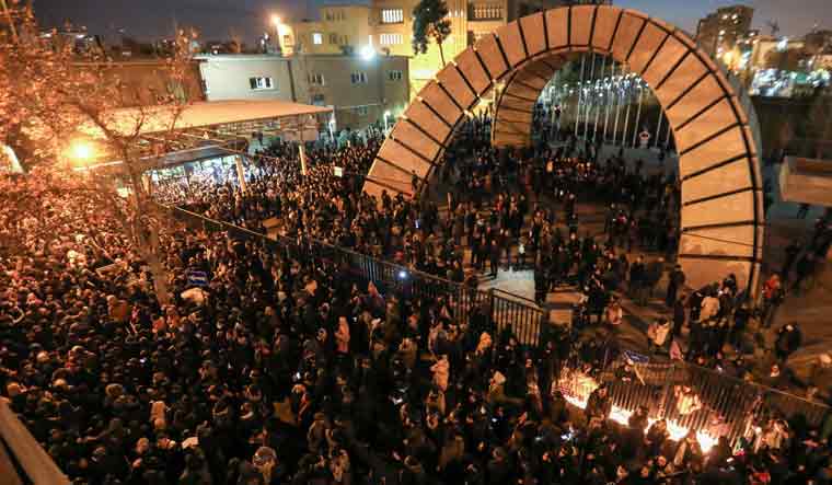Iranians students demonstrate following a tribute for the victims of Ukraine International Airlines Boeing 737 in front of the Amirkabir University in the capital Tehran on Saturday | AFP