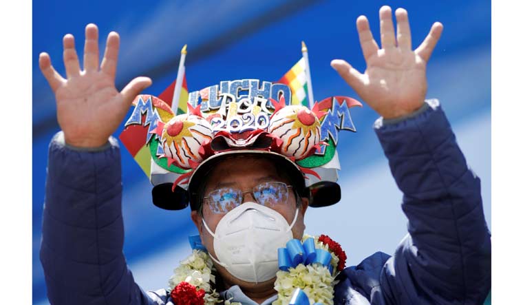 Luis Arce gestures during a celebration after he won the presidential election, in El Alto, outskirts of La Paz, Bolivia | Reuters