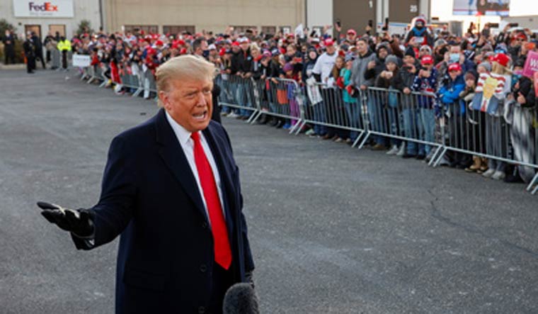 US President Donald Trump interacting with the press in Minnesota | Reuters