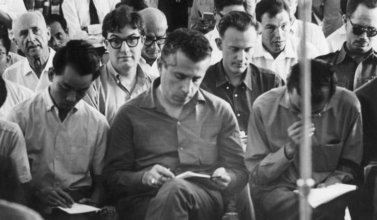 Journalists attend a briefing by military officers in Saigon, in this 1963 file photo. At center, foreground, is Seymour Topping of the New York Times | AP