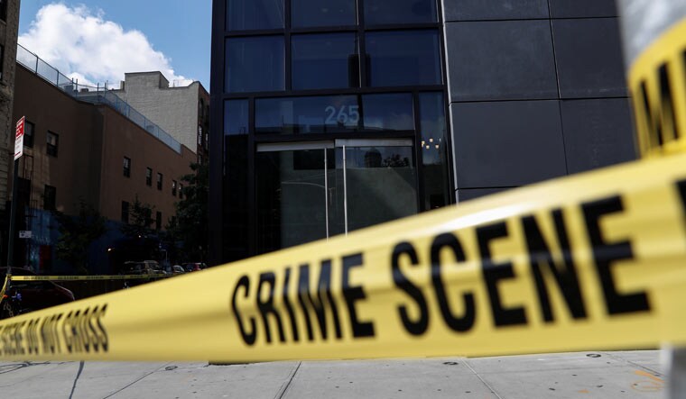 NYPD crime scene tape blocks the entrance to 265 Houston Street, where Fahim Saleh, Co-founder/CEO of Gokada, was found dead at the apartment building in New York City, New York, U.S., July 15, 2020 | REUTERS
