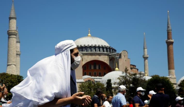 A worshipper outside Hagia Sophia | Reuters