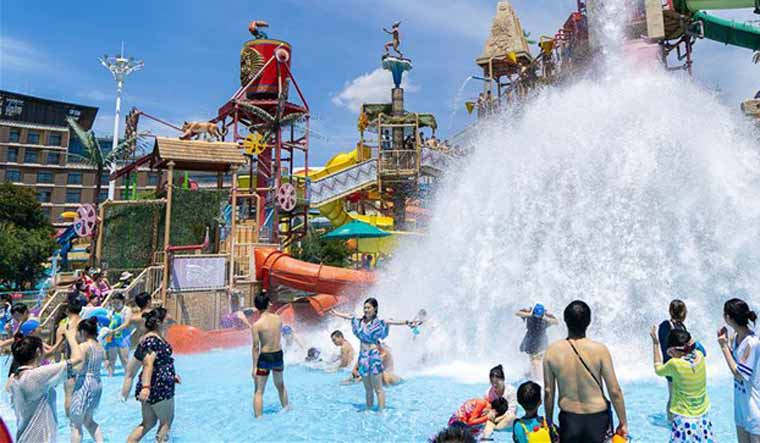 Wuhan hosts huge water park party as it distances itself from COVID-19 ...