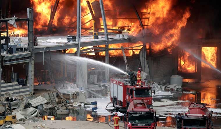 Firefighters work to extinguish a fire at warehouses at the seaport in Beirut, Lebanon, Thursday, Sept. 10. 2020 | AP