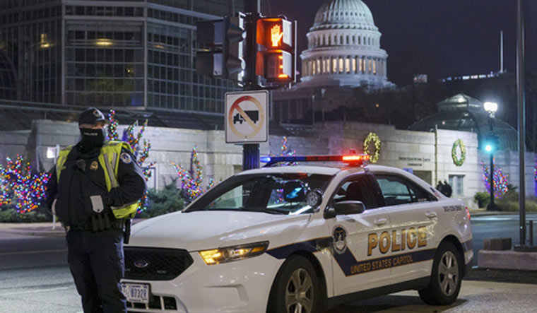 A US Capitol Police officer stands watch on Independence Avenue | AP