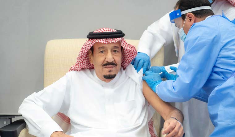 Saudi King Salman bin Abdulaziz gets a dose of a COVID-19 vaccine in Neom | Reuters
