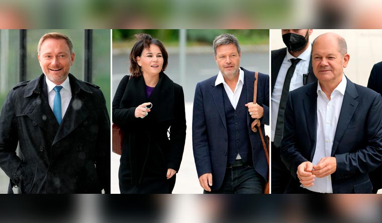 (From left) Christian Lindner, chairman of the German Liberals (FDP), Annalena Baerbock, co-chairwoman of the German Green party (Die Gruenen), Robert Habeck, co-chairman of the German Green party (Die Gruenen) and Olaf Scholz of the German Social Democratic Party (SPD)