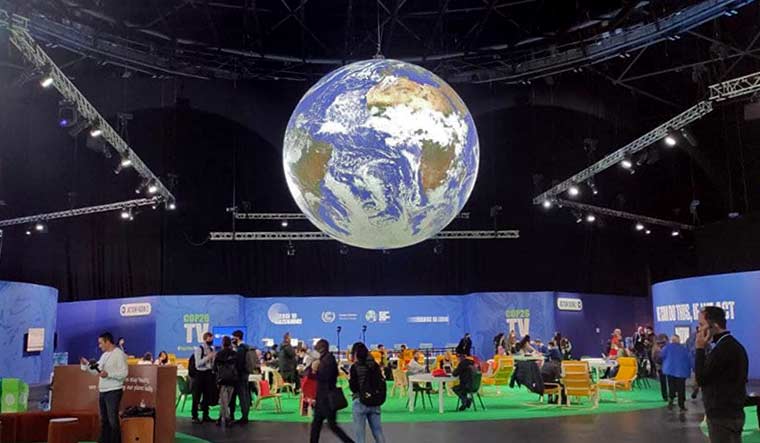 An installation of planet Earth at the COP26 venue in Glasgow | Rekha Dixit 
