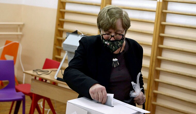 A person votes during parliamentary and presidential elections, in Sofia, Bulgaria, November 14, 2021 | Reuters