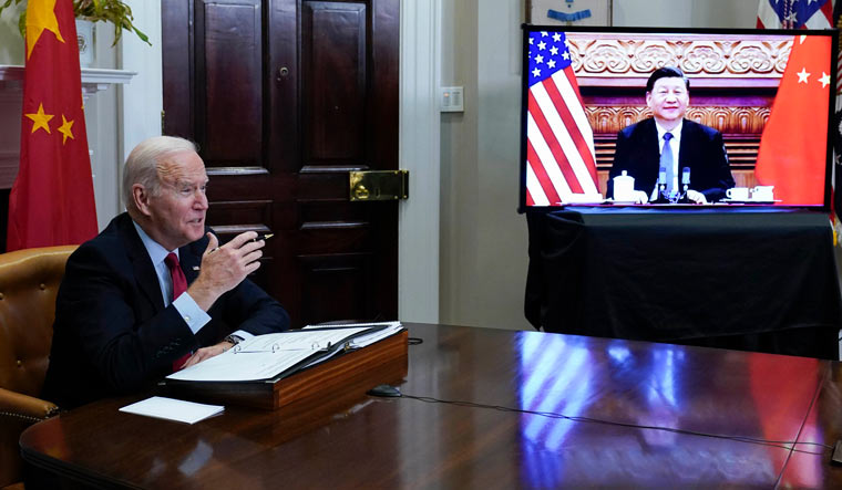 President Joe Biden meets virtually with Chinese President Xi Jinping from the Roosevelt Room of the White House in Washington | AP