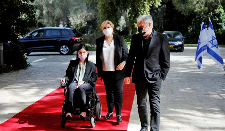 Karine Elharrar, Orna Barbivai and Meir Cohen from the Yesh Atid party arrive for consultations on the formation of a coalition government, at the President's residence in Jerusalem April 5, 2021 | Reuters