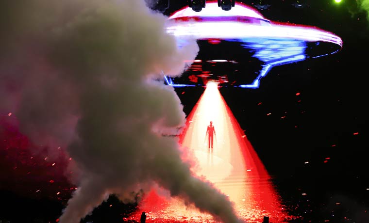 An avatar of El Salvador's President Nayib Bukele is projected on a LED screen, descending from a flying saucer during the closing ceremony of a congress for cryptocurrency investors in Santa Maria Mizata, El Salvador, Saturday, Nov. 20, 2021 | AP