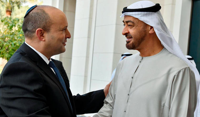 Israeli Prime Minister Naftali Bennett, left, shakes hands with Sheikh Mohammed bin Zayed Al Nahyan, the crown prince of Abu Dhabi and de facto ruler of the United Arab Emirates, in Abu Dhabi, United Arab Emirates, Monday, Dec. 13 | PTI