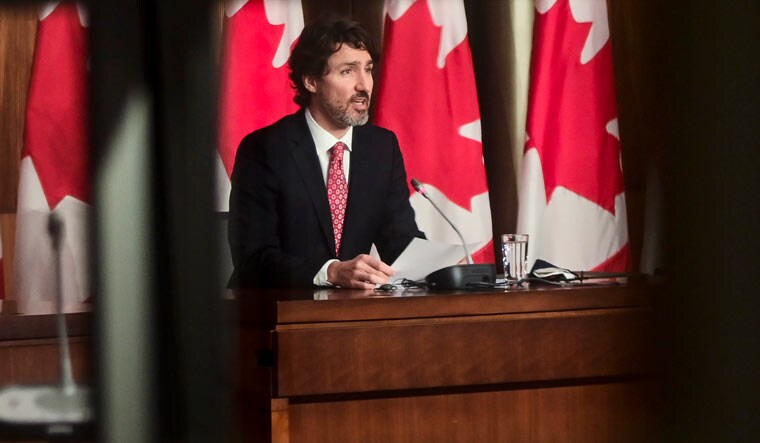 Canadian Prime Minister Justin Trudeau holds a press conference in Ottawa, Ontario, on Friday, Feb. 26, 2021, to provide an update on the COVID-19 pandemic and vaccine rollout in Canada |Sean Kilpatrick/The Canadian Press via AP
