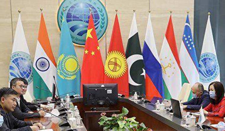File photo: Flags of the SCO members from a May meeting | SCO Facebook