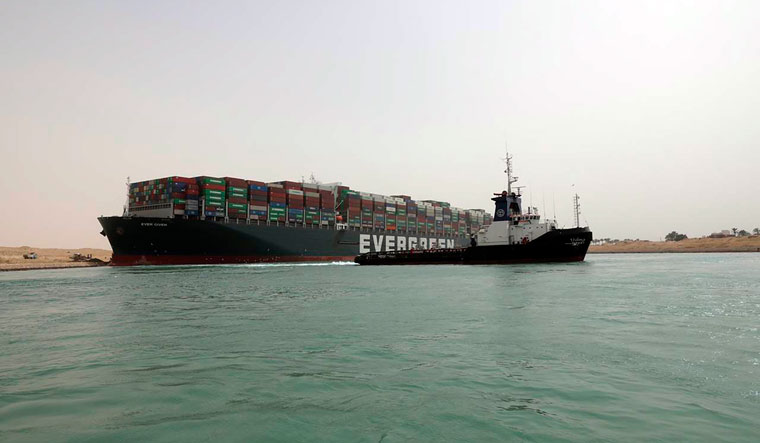 The Ever Given, a Panama-flagged cargo ship, after it become wedged across the Suez Canal and blocking traffic in the vital waterway | AP