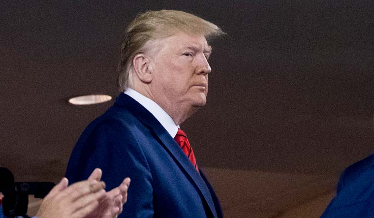 File photo of former US President Donald Trump at a World Series baseball game in 2019 |  AP Photo/Andrew Harnik, File